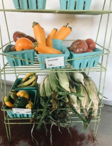 a box filled with lots of fresh produce