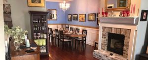 a living room filled with furniture and a fire place