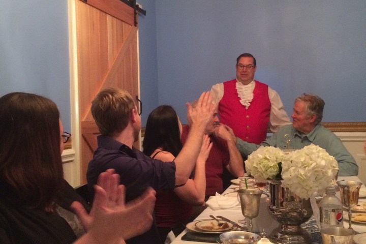 a group of people sitting at a table