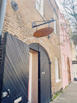Processed with VSCO with kp8 preset a close up of a brick building